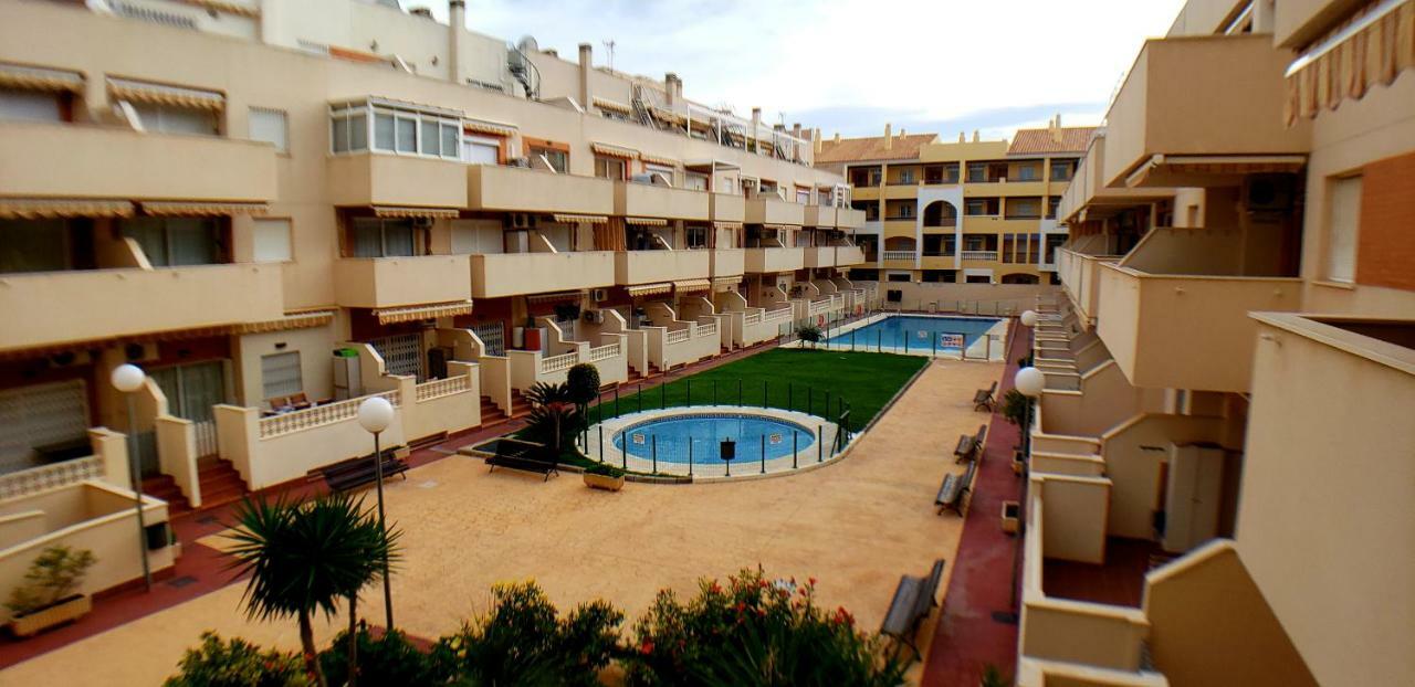Roquetas Beach House Apartamento Fresco Con Piscina Roquetas de Mar Bagian luar foto